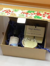 Load image into Gallery viewer, Christmas gift box with a Face oil, a soap and a small lemon and frankincense heart